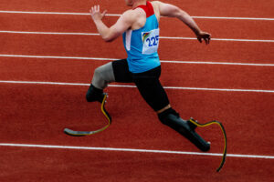 male para athlete on two limbs deficiency run up long jump, summer para athletics championships