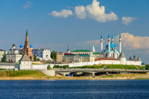 View of the Kazan Kremlin with Presidential Palace, Annunciation Cathedral, Soyembika Tower and Qolsharif Mosque from Kazanka River, Kazan, Russia.